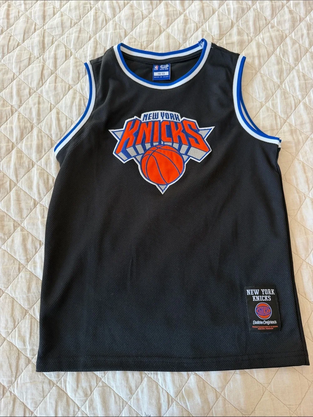 Kids' Black Basketball Jersey with Orange Logo